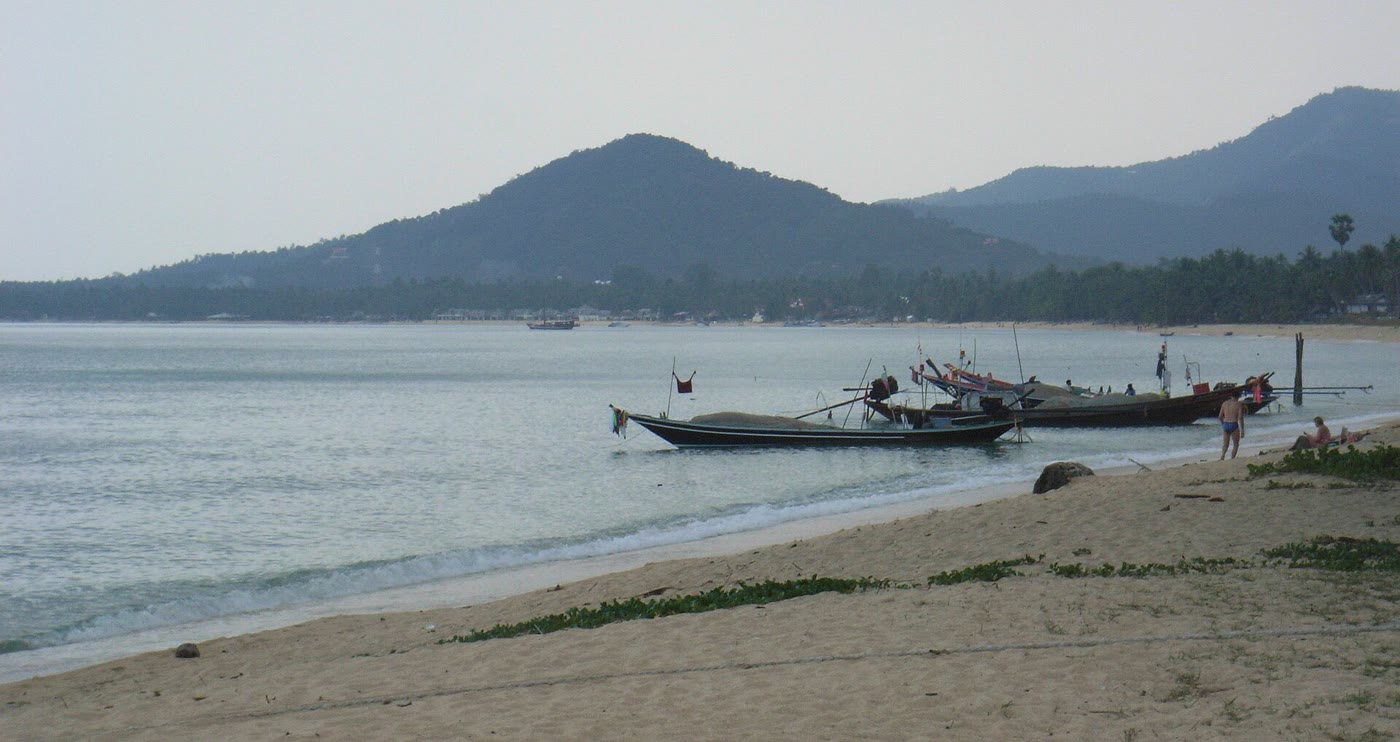 Fishing boats pulled onto the sand at the north end of Bo Phut Beach, Koh Samui