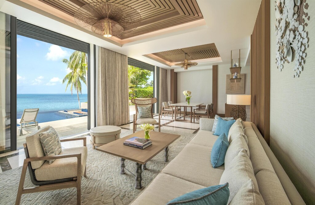 Conrad Koh Samui villa living room opening onto the private pool
