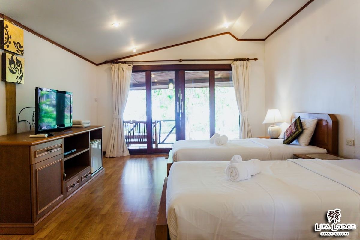 Lipa Lodge Beach Resort pool and grounds in Nathon