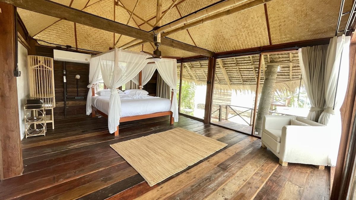 RoomQuest T H E V A Resort Koh Samui pool and grounds in Nathon